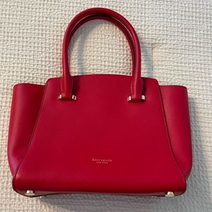 Cute Kate Spade Red Date night purse. Shoulder strap included, and dust bag.